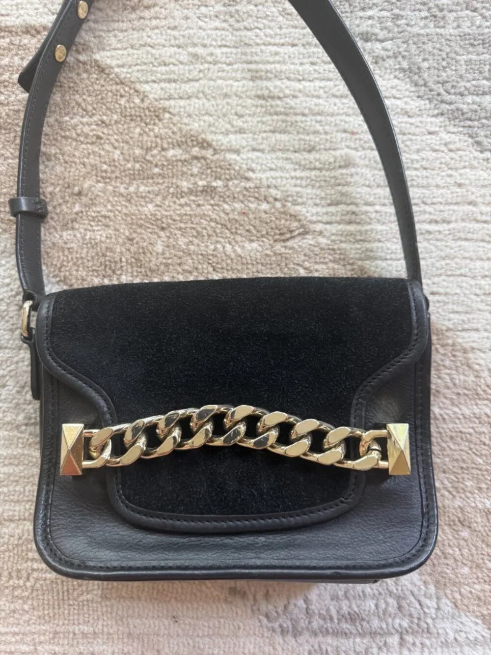 Karl Lagerfeld black crossbody bag crafted from genuine leather and natural sued